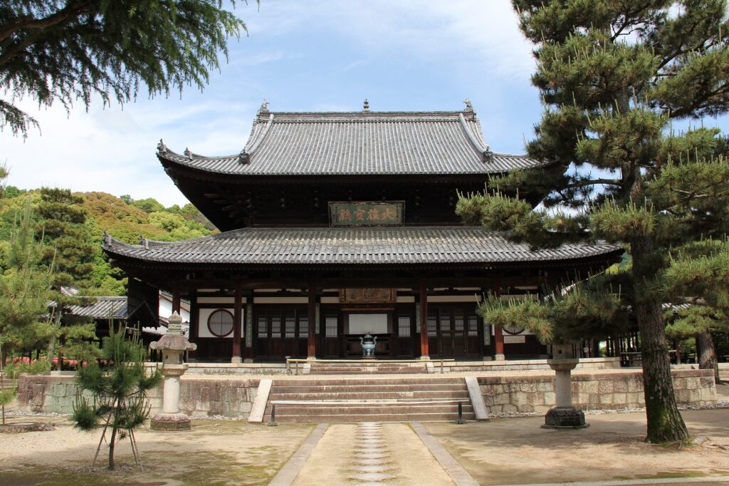 Obaku-san Manpuku-ji Temple from the front with tall pine trees