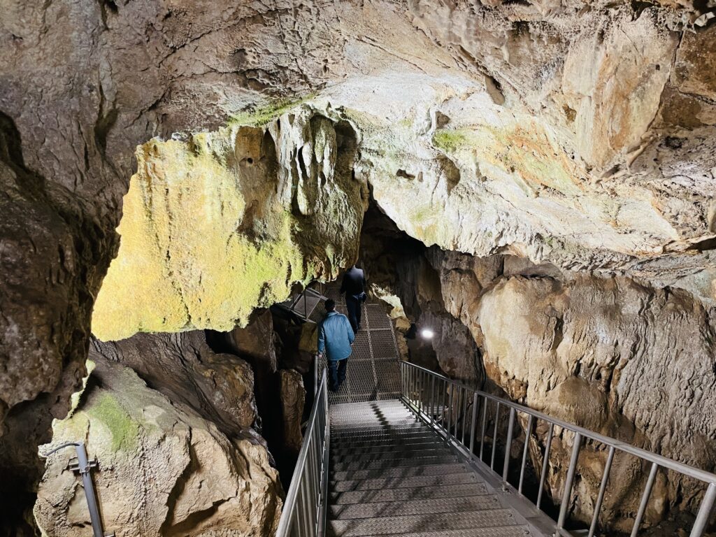 Going down the cave stairs