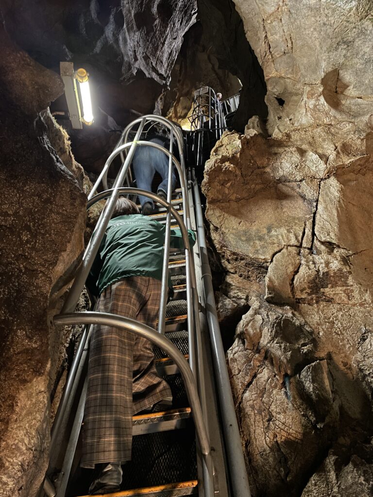 Descending into the cave