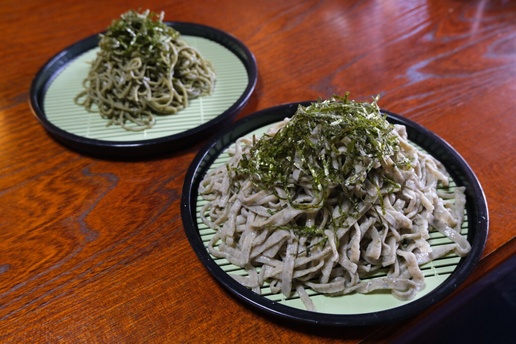 Handmade soba noodles topped with nori seaweed