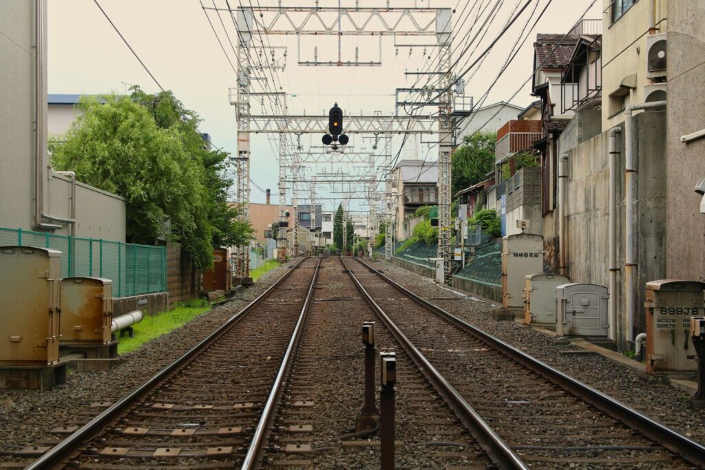 Train tracks in Japan running through a neighborhood