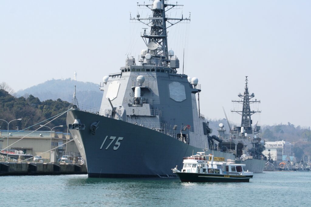 A close-up shot of a Japanese naval vessel in Maizuru bay