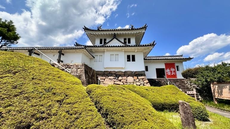 The remains of Tanabe Castle with its stone foundation and greenery